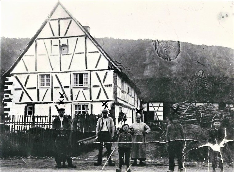 Family in front of Obersteinbach house, est. 1890s - Copy